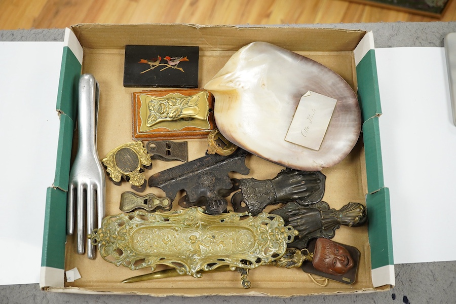 A collection of novelty hand and other desk paper clips, including a large mother of pearl shell, a pietra dura plaque and a brass pen stand, 22cm high. Condition - one poor but mostly fair to good